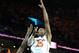 CHARLOTTESVILLE, VA - MARCH 01: Akil Mitchell #25 of the Virginia Cavaliers takes a shot over C.J. Fair #5 of the Syracuse Orange during the first half at John Paul Jones Arena on March 1, 2014 in Charlottesville, Virginia. (Photo by Rich Barnes/Getty I