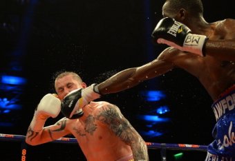 GLASGOW, SCOTLAND - MARCH 1 : Ricky Burns and Terence Crawford clash during the WBO World Lightweight Championship Boxing match at the Glasgow SECC on March 1 2014 in Glasgow, Scotland. (Photo by Mark Runnacles/Getty Images)