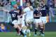 Duncan Weird secures victory with a last-minute drop goal against Italy.