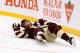 VANCOUVER, BC - MARCH 02: (EDITORIAL USE ONLY) Daniel Sedin #22 of the Vancouver Canucks falls to the ice during the second period of the 2014 Tim Hortons NHL Heritage Classic game against the Vancouver Canucks at BC Place on March 2, 2014 in Vancouver,