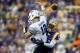 Oct 26, 2013; Baton Rouge, LA, USA; LSU Tigers cornerback Dwayne Thomas (13) hits Furman Paladins quarterback Reese Hannon (12) as he throws to cause an incomplete pass during the first quarter of a game at Tiger Stadium. Mandatory Credit: Derick E. Hingl