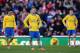 STOKE ON TRENT, ENGLAND - MARCH 01: Jack Wilshere of Arsenal and his team-mates look dejected after conceding the opening goal during the Barclays Pemier League match between Stoke City and Arsenal at the Britannia Stadium on March 1, 2014 in Stoke on Tr