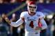 LAS VEGAS, NV - DECEMBER 21: Quarterback Derek Carr #4 of the Fresno State Bulldogs signals teammates during the team's game against the USC Trojans in the Royal Purple Las Vegas Bowl at Sam Boyd Stadium on December 21, 2013 in Las Vegas, Nevada. USC won