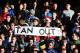 LIVERPOOL, ENGLAND - DECEMBER 21: Cardiff City fans display a banner showing their displeasure for their teams owner Vincent Tan before the Barclays Premier League match between Liverpool and Cardiff City at Anfield on December 21, 2013 in Liverpool, Eng