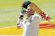 CAPE TOWN, SOUTH AFRICA - MARCH 04: David Warner of Australia celebrates after reaching 100 runs during day 4 of the third test match between South Africa and Australia at Sahara Park Newlands on March 4, 2014 in Cape Town, South Africa. (Photo by Morne