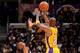 LOS ANGELES, CA - JANUARY 28: Jodie Meeks #20 of the Los Angeles Lakers shoots against C.J. Watson #32 of the Indiana Pacers at STAPLES Center on January 28, 2014 in Los Angeles, California. NOTE TO USER: User expressly acknowledges and agrees that, by do