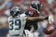 HOUSTON, TX - SEPTEMBER 29: Andre Johnson #80 of the Houston Texans has the ball knocked away by Brandon Browner at Reliant Stadium on September 29, 2013 in Houston, Texas. (Photo by Bob Levey/Getty Images)