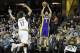 Feb 5, 2014; Cleveland, OH, USA; Los Angeles Lakers point guard Jordan Farmar (1) shoots against Cleveland Cavaliers center Anderson Varejao (17) in the second quarter at Quicken Loans Arena. Mandatory Credit: David Richard-USA TODAY Sports