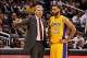 Jan 24, 2014; Orlando, FL, USA; Los Angeles Lakers head coach Mike D'Antoni talks with point guard Kendall Marshall (12) against the Orlando Magic during the second half at Amway Center. Orlando Magic defeated the Los Angeles Lakers 114-105. Mandatory Cr