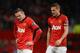 MANCHESTER, ENGLAND - FEBRUARY 09: Wayne Rooney of Manchester United looks on with Nemanja Vidic (R) during the Barclays Premier League match between Manchester United and Fulham at Old Trafford on February 9, 2014 in Manchester, England. (Photo by Mich