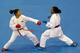 GUADALAJARA, MEXICO - OCTOBER 28: Cheryl Murphy of the USA (Blue) fights Yoly Guillen of Venezuela during a Karate match during Day 14 of the XVI Pan American Games at the San Rafael Parks Sports Complex on October 28, 2011 in Guadalajara, Mexico. (Phot