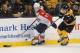 BOSTON, MA - MARCH 4: Marcel Goc #57 of the Florida Panthers skates against Torey Krug #47 of the Boston Bruins at the TD Garden on March 4, 2014 in Boston, Massachusetts. (Photo by Steve Babineau/NHLI via Getty Images)