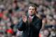 LIVERPOOL, ENGLAND - FEBRUARY 08: Liverpool Manager Brendan Rodgers applauds during the Barclays Premier League match between Liverpool and Arsenal at Anfield on February 8, 2014 in Liverpool, England. (Photo by Michael Regan/Getty Images)