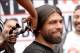 Jan 21, 2014; Los Angeles, CA, USA; Vanessa Lee cuts the hair of fighter Alfredo Angulo for a donation it to Locks of Love. He cut his hair before the scheduled press conference held at the Los Angeles Central Public Library to announce the 12-round super