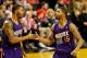 Nov 13, 2013; Portland, OR, USA; Phoenix Suns power forward Marcus Morris (15) and power forward Markieff Morris (11) high five after scoring against the Portland Trail Blazers at the Moda Center. Mandatory Credit: Craig Mitchelldyer-USA TODAY Sports