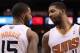 PHOENIX, AZ - DECEMBER 18: (L-R) Marcus Morris #15 and Markieff Morris #11 of the Phoenix Suns during the NBA game against the San Antonio Spurs at US Airways Center on December 18, 2013 in Phoenix, Arizona. The Spurs defeated the Suns 108-101. NOTE TO U