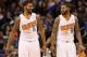 PHOENIX, AZ - DECEMBER 21: (L-R) Markieff Morris #11 and Marcus Morris #15 of the Phoenix Suns react during the NBA game against the Dallas Mavericks at US Airways Center on December 21, 2013 in Phoenix, Arizona. The Suns defeated the Mavericks 123-108.