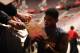 DETROIT, MI - DECEMBER 16: Kyrie Irving #2 of the Cleveland Cavaliers signs autographs before the basketball game against the Detroit Pistons during the preseason game on December 16, 2011 at The Palace of Auburn Hills in Auburn Hills, Michigan. NOTE TO