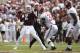 COLLEGE STATION, TX - SEPTEMBER 14: Johnny Manziel #2 of the Texas A&M Aggies throws a pass as Brandon Wilson #36 and A'Shawn Robinson#86 of the Alabama Crimson Tide bears down on him at Kyle Field on September 14, 2013 in College Station, Texas. (Photo