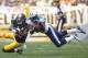 PITTSBURGH, PA - SEPTEMBER 08: Alterraun Verner #20 of the Tennessee Titans intercepts a pass intended for Emmanuel Sanders #88 of the Pittsburgh Steelers in the first half during the game on September 8, 2013 at Heinz Field in Pittsburgh, Pennsylvania. (