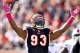 CINCINNATI, OH - OCTOBER 02: Michael Johnson #93 of the Cincinnati Bengals celebrates during the 23-20 victory against the Buffalo Bills at Paul Brown Stadium on October 2, 2011 in Cincinnati, Ohio. (Photo by Andy Lyons/Getty Images)