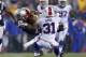 FOXBORO, MA - DECEMBER 29: Stevan Ridley #22 of the New England Patriots gains yards against the defense of Jairus Byrd #31 of the Buffalo Bills in the 1st quarter at Gillette Stadium on December 29, 2013 in Foxboro, Massachusetts. (Photo by Jim Rogash/Ge