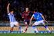 SAN SEBASTIAN, SPAIN - FEBRUARY 22: Andres Iniesta of FC Barcelona duels for the ball with Gorka Elustondo Urkola (L) and Mikel Gonzalez Martinez of Real Sociedad during the La Liga match between Real Sociedad and FC Barcelona at Estadio Anoeta on Februa