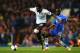 LONDON, ENGLAND - MARCH 08: Emmanuel Adebayor of Spurs is challenged by Ramires of Chelsea during the Barclays Premier League match between Chelsea and Tottenham Hotspur at Stamford Bridge on March 8, 2014 in London, England. (Photo by Clive Rose/Getty