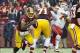 Dec 8, 2013; Landover, MD, USA; Washington Redskins quarterback Robert Griffin III (10) scrambles against the Kansas City Chiefs during the second half at FedEx Field. The Chiefs won 45 - 10. Mandatory Credit: Brad Mills-USA TODAY Sports