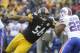 PITTSBURGH, PA - NOVEMBER 10: LaMarr Woodley #56 of the Pittsburgh Steelers stretches to tackle Fred Jackson #22 of the Buffalo Bills during the second quarter at Heinz Field on November 10, 2013 in Pittsburgh, Pennsylvania. (Photo by Vincent Pugliese/Get