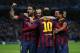 MANCHESTER, ENGLAND - FEBRUARY 18: Lionel Messi of Barcelona celebrates scoring the opening goal from a penalty kick with his team-mates during the UEFA Champions League Round of 16 first leg match between Manchester City and Barcelona at the Etihad Stad