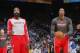 OAKLAND, CA - DECEMBER 13: James Harden #13 and Dwight Howard #12 of the Houston Rockets warm up prior to the game against the Golden State Warriors on December 13, 2013 at Oracle Arena in Oakland, California. NOTE TO USER: User expressly acknowledges and