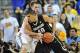 February 13, 2014; Los Angeles, CA, USA; Colorado Buffaloes forward Josh Scott (40) moves to the basket against UCLA Bruins forward David Wear (12) during the second half at Pauley Pavilion. Mandatory Credit: Gary A. Vasquez-USA TODAY Sports