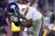 Dec 1, 2013; Landover, MD, USA; New York Giants defensive end Justin Tuck (91) celebrates after making a tackle against the Washington Redskins in the fourth quarter at FedEx Field. The Giants won 24-17. Mandatory Credit: Geoff Burke-USA TODAY Sports