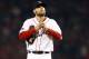 Oct 30, 2013; Boston, MA, USA; Boston Red Sox starting pitcher John Lackey (41) reacts during the fifth inning of game six of the MLB baseball World Series against the St. Louis Cardinals at Fenway Park. Mandatory Credit: Greg M. Cooper-USA TODAY Sports
