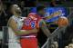 Feb 4, 2014; Providence, RI, USA; Providence Friars forward Kadeem Batts (10) fouls St. John's Red Storm forward JaKarr Sampson (14) during the second half at the Dunkin' Donuts Center. St. John's defeated Providence 86-76. Mandatory Credit: Stew Milne-US