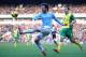 NORWICH, ENGLAND - FEBRUARY 08: David Silva of Manchester City crosses the ball during the Barclays Premier League match between Norwich City and Manchester City at Carrow Road on February 8, 2014 in Norwich, England. (Photo by Tony Marshall/Getty Imag