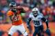 DENVER, CO - DECEMBER 8: Wide receiver Eric Decker #87 of the Denver Broncos hauls in a second quarter pass against the Tennessee Titans at Sports Authority Field Field at Mile High on December 8, 2013 in Denver, Colorado. (Photo by Dustin Bradford/Gett