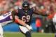 CHICAGO, IL - NOVEMBER 25: Henry Melton #69 of the Chicago Bears rushes against Brandon Fusco #63 of the Minnesota Vikings at Soldier Field on November 25, 2012 in Chicago, Illinois. The Bears defeated the Vikings 28-10. (Photo by Jonathan Daniel/Getty I