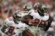 GLENDALE, AZ - OCTOBER 31: Aqib Talib #25 of the Tampa Bay Buccaneers reacts to his interception against the Arizona Cardinals during the fourth quarter at University of Phoenix Stadium on October 31, 2010 in Glendale, Arizona. (Photo by Harry How/Getty