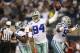 ARLINGTON, TX - DECEMBER 29: DeMarcus Ware #94 and Morris Claiborne #24 of the Dallas Cowboys celebrate a fumble recovery in the second half against the Philadelphia Eagles at Cowboys Stadium on December 29, 2013 in Arlington, Texas. (Photo by Ronald Ma