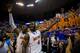 GAINESVILLE, FL - MARCH 08: Will Yeguete #15 and Patric Young #4 of the Florida Gators lead the crowd in singing 'happy birthday' to Michael Frazier II (not pictured) after the game against the Kentucky Wildcats at the Stephen C. O'Connell Center on March