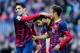 BARCELONA, SPAIN - NOVEMBER 23: Cesc Fabregas (C) of FC Barcelona celebrates with his teammates Marc Bartra (L) and Neymar after scoring his team's second goal from the penalty spot during the La Liga match between FC Barcelona and Granda CF at Camp Nou