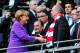 Hoeness greets German chancellor Angela Merkel at last year's Champions League Final, which Bayern Munich would go on to win.