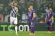 TURIN, ITALY - MARCH 13: Arturo Vidal (L) of Juventus celebrates after scoring the opening goal during the UEFA Europa League Round of 16 match between Juventus and ACF Fiorentina at Juventus Arena on March 13, 2014 in Turin, Italy. (Photo by Valerio Pe