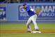 August 27, 2013; Los Angeles, CA, USA; Chicago Cubs shortstop Starlin Castro (13) throws to first to complete an out in the eighth inning against the Los Angeles Dodgers at Dodger Stadium. Mandatory Credit: Gary A. Vasquez-USA TODAY Sports