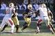 Dec 28, 2013; Bronx, NY, USA; Notre Dame Fighting Irish running back Tarean Folston (25) runs the ball against the Rutgers Scarlet Knights during the first half of the Pinstripe Bowl at Yankees Stadium. Notre Dame Fighting Irish won the game 29-16. Mandat
