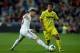 MADRID, SPAIN - FEBRUARY 08: Jese Rodriguez (L) of Real Madrid CF competes for the ball with Giovani Dos Santos (R) of Villarreal CF during the La Liga match between Real Madrid CF and Villarreal CF at Estadio Santiago Bernabeu on February 8, 2014 in Madr
