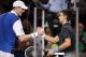 John Isner and Novak Djokovic