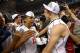 GREENSBORO, NC - MARCH 16: Malcolm Brogdon #15 and Joe Harris #12 of the Virginia Cavaliers celebrate after they beat the Duke Blue Devils in the finals of the 2014 Men's ACC Basketball Tournament at Greensboro Coliseum on March 16, 2014 in Greensboro, N